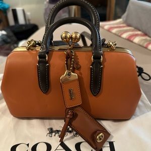 Coach NY exclusive kisslock satchel